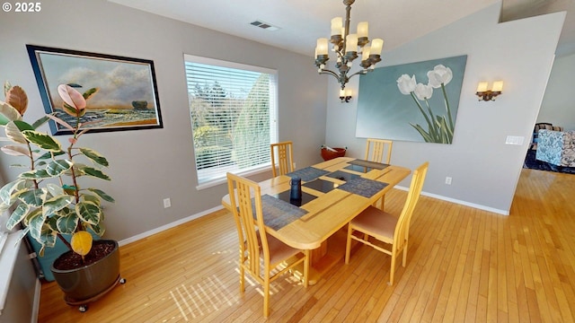 94342 Gauntlett St, Gold Beach, OR 97444 - dining area with a chandelier and light wood-style flooring