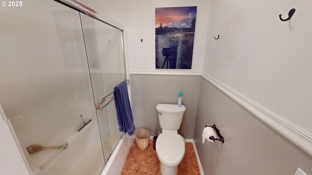 94342 Gauntlett St, Gold Beach, OR 97444 - bathroom featuring a shower with shower door and toilet