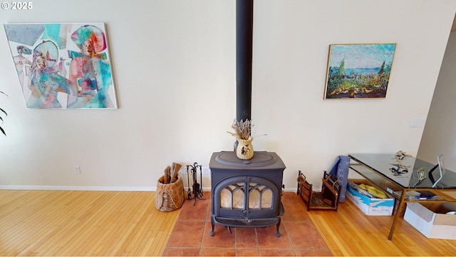 94342 Gauntlett St, Gold Beach, OR 97444 - detailed view of a wood stove and wood finished floors