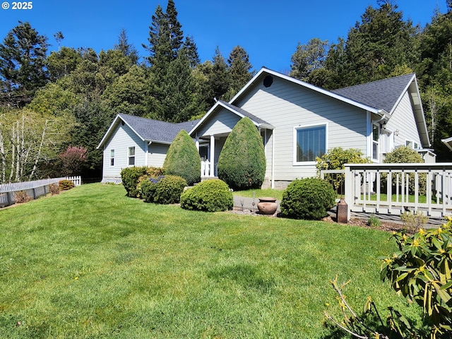 94342 Gauntlett St, Gold Beach, OR 97444 - view of side of property featuring a deck and a shingled roof