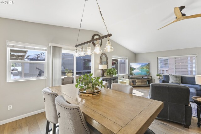 50990 Dike Rd Unit B3, Scappoose, OR 97056 - dining room with lofted ceiling, light wood finished floors, baseboards, and ceiling fan