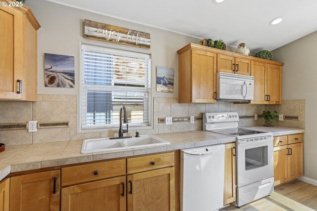 50990 Dike Rd Unit B3, Scappoose, OR 97056 - kitchen with white appliances, a sink, plenty of natural light, backsplash, and recessed lighting