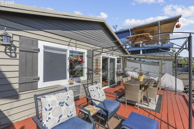 50990 Dike Rd Unit B3, Scappoose, OR 97056 - wooden deck featuring outdoor dining space