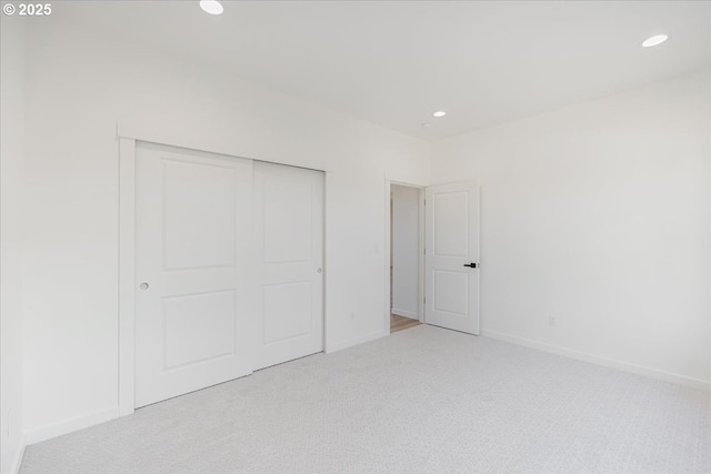 1081 SE Balsamroot Ln, Madras, OR 97741 - unfurnished bedroom featuring carpet floors, recessed lighting, and a closet