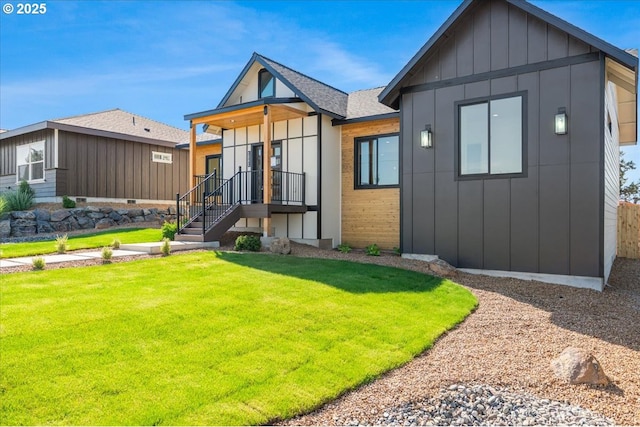 1081 SE Balsamroot Ln, Madras, OR 97741 - contemporary house with a front yard, board and batten siding, and a shingled roof