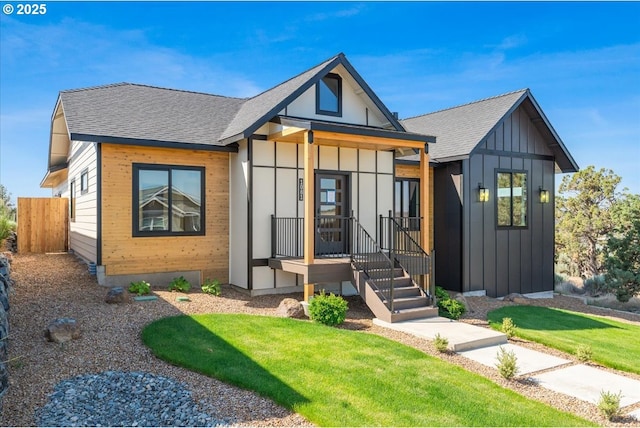 1081 SE Balsamroot Ln, Madras, OR 97741 - view of front facade featuring board and batten siding and roof with shingles