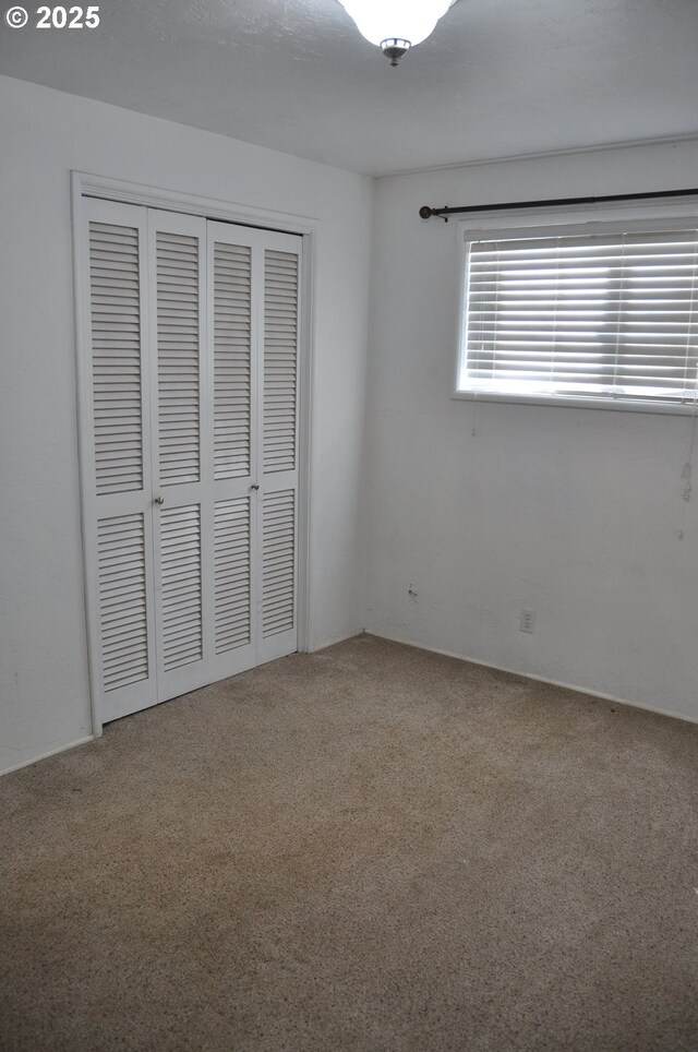 25821 Jeans Rd, Veneta, OR 97487 - unfurnished bedroom with a closet and carpet