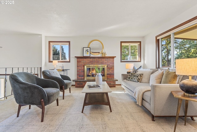 living area featuring light carpet and a brick fireplace