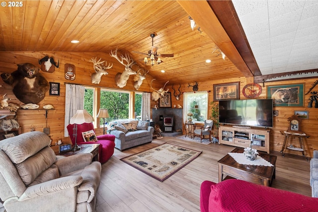 96863 Sitkum Ln, Myrtle Point, OR 97458 - living area featuring wood walls, lofted ceiling, ceiling fan, hardwood / wood-style floors, and wooden ceiling