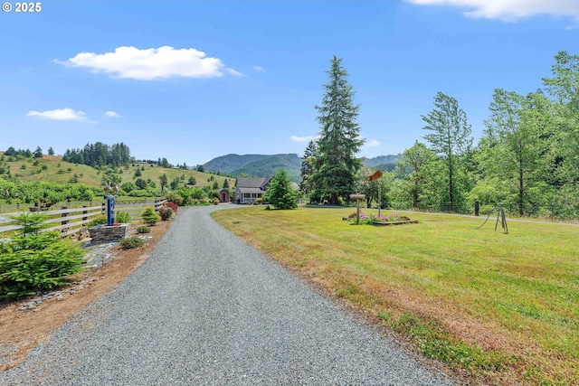 96863 Sitkum Ln, Myrtle Point, OR 97458 - view of dirt / gravel road with a mountain view and a view of countryside