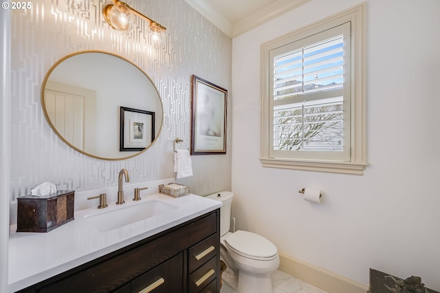 half bath featuring toilet, wallpapered walls, baseboards, and vanity