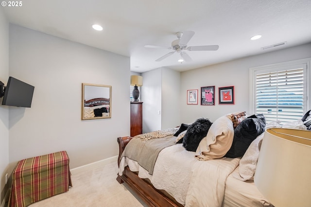 bedroom with a ceiling fan, recessed lighting, visible vents, and light carpet