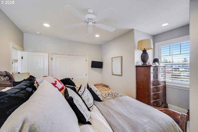 bedroom with ceiling fan, a closet, and recessed lighting