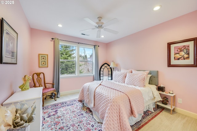 carpeted bedroom with a ceiling fan, recessed lighting, visible vents, and baseboards