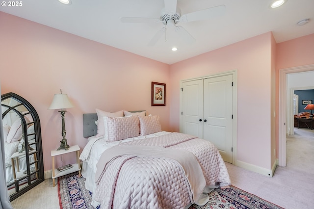 bedroom with baseboards, ceiling fan, a closet, and recessed lighting