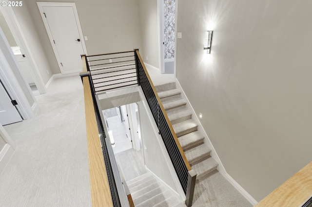 stairway with carpet floors