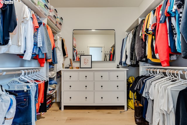 spacious closet featuring light wood-type flooring