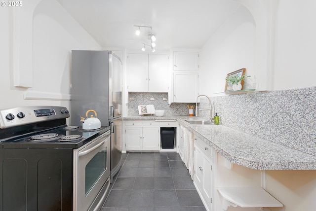 kitchen with a sink, white cabinetry, backsplash, stainless steel electric stove, and open shelves