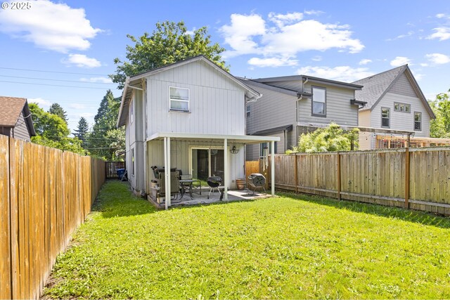 9206 N Smith St, Portland, OR 97203 - back of house featuring board and batten siding and a patio area