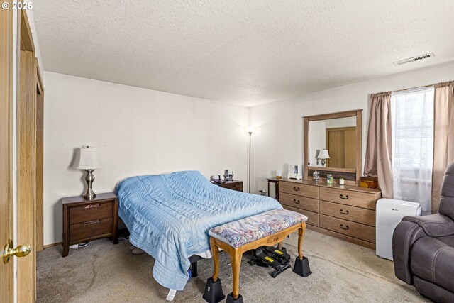 9206 N Smith St, Portland, OR 97203 - bedroom featuring light colored carpet and a textured ceiling