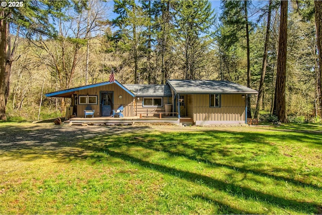 625 Wilson Rd, Mosier, OR 97040 - view of front facade with a front lawn, board and batten siding, and a deck