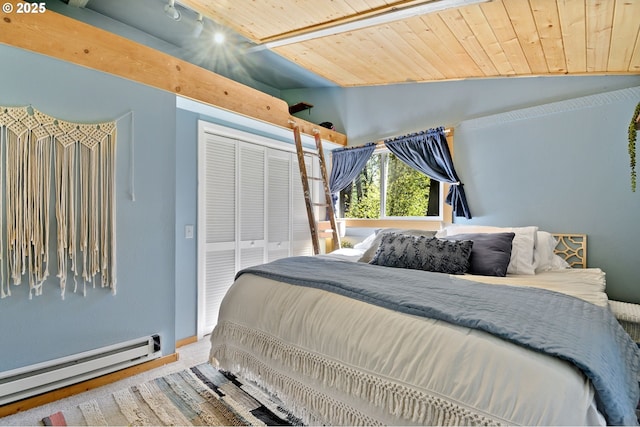 625 Wilson Rd, Mosier, OR 97040 - bedroom featuring a baseboard radiator, a closet, vaulted ceiling, wooden ceiling, and carpet