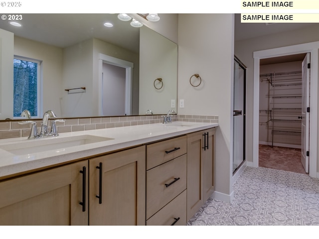 16513 SE Smith Rock St Unit 732, Happy Valley, OR 97086 - full bath with double vanity, a shower stall, decorative backsplash, recessed lighting, and a spacious closet