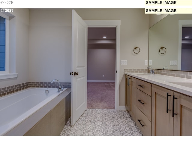 16513 SE Smith Rock St Unit 732, Happy Valley, OR 97086 - full bath featuring double vanity, a bath, tile patterned floors, and baseboards