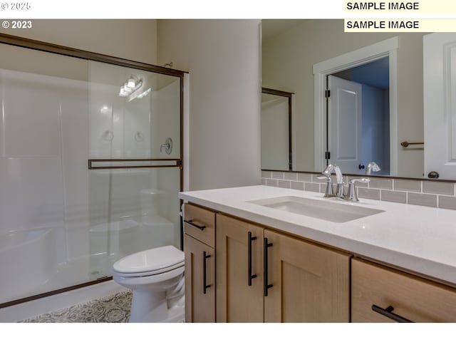 16513 SE Smith Rock St Unit 732, Happy Valley, OR 97086 - full bath with vanity, toilet, tasteful backsplash, a shower stall, and tile patterned flooring