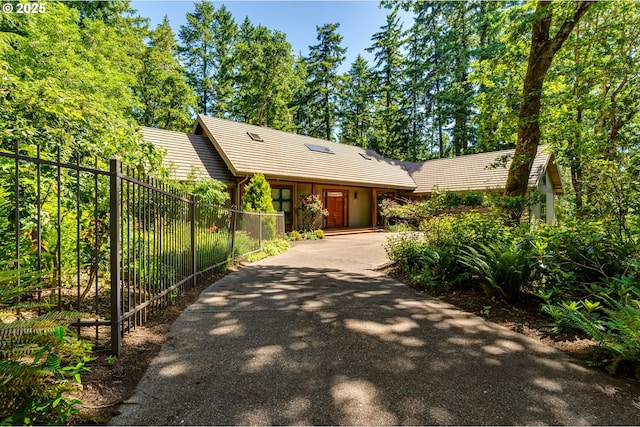 2405 Blacktail Dr, Eugene, OR 97405 - view of front of home with a tiled roof