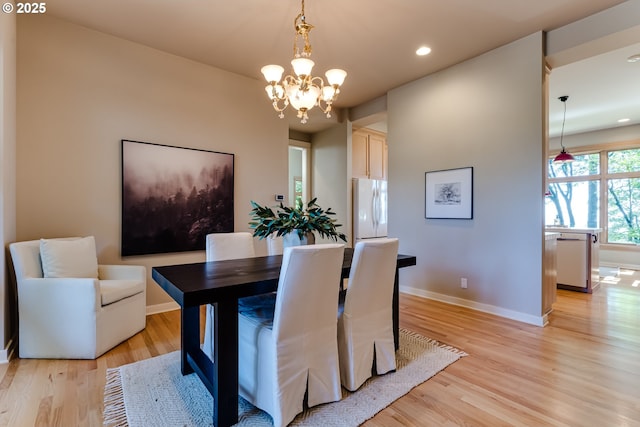 2405 Blacktail Dr, Eugene, OR 97405 - dining space with light wood-style floors, baseboards, a chandelier, and recessed lighting