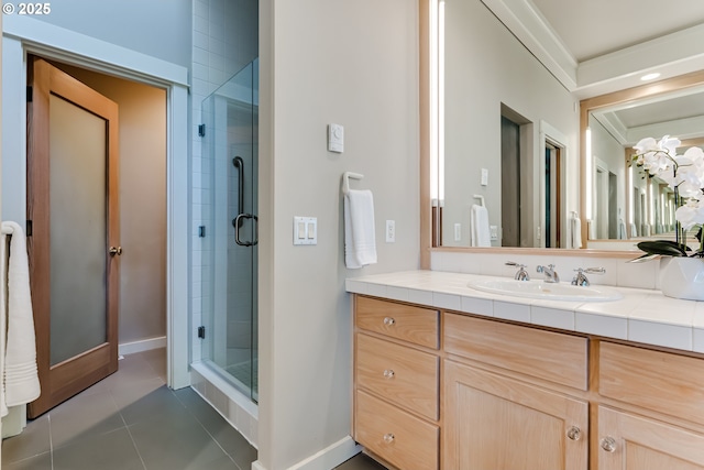 2405 Blacktail Dr, Eugene, OR 97405 - full bathroom with a stall shower, vanity, tile patterned floors, crown molding, and baseboards