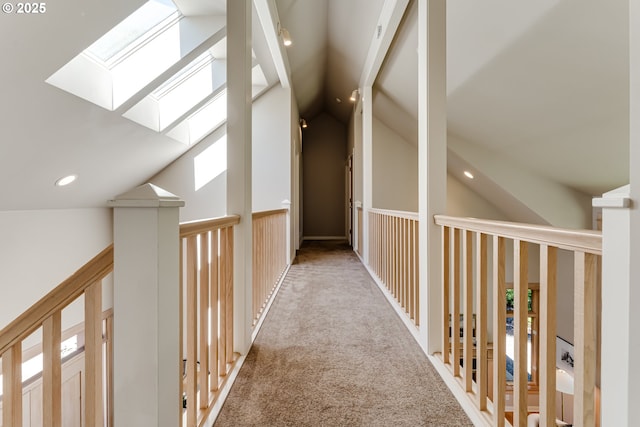 2405 Blacktail Dr, Eugene, OR 97405 - corridor featuring a skylight, vaulted ceiling, carpet floors, and recessed lighting