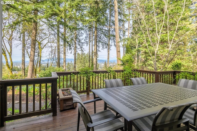 2405 Blacktail Dr, Eugene, OR 97405 - deck with outdoor dining space and a mountain view