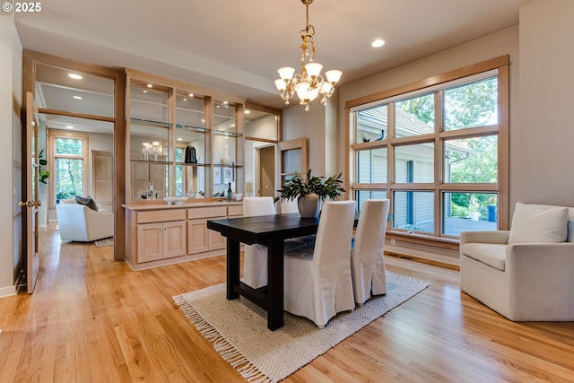 2405 Blacktail Dr, Eugene, OR 97405 - dining space featuring a chandelier, light wood-type flooring, and recessed lighting