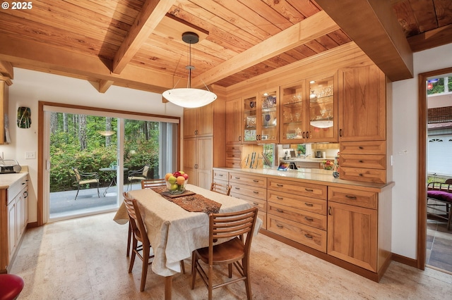 231 E Dunoon Pl, Shelton, WA 98584 - dining area with wood ceiling, beam ceiling, light wood-style flooring, and plenty of natural light