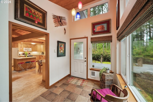 231 E Dunoon Pl, Shelton, WA 98584 - entrance foyer with baseboards, a high ceiling, and wood ceiling