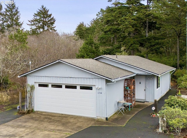 ranch-style house featuring a garage