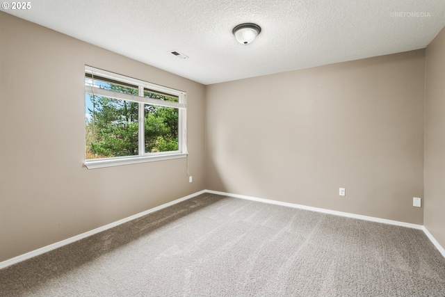 17665 SW Elder View Dr, Sherwood, OR 97140 - unfurnished room with a textured ceiling, visible vents, baseboards, and carpet