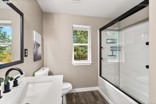 17665 SW Elder View Dr, Sherwood, OR 97140 - full bathroom with vanity, visible vents, toilet, wood finished floors, and baseboards