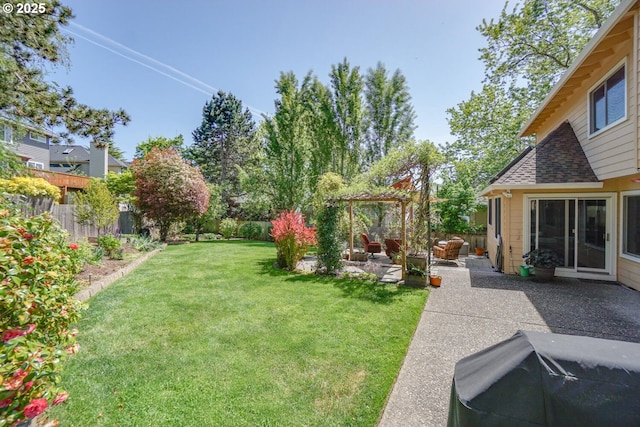 view of yard with a patio area, a pergola, and a fenced backyard