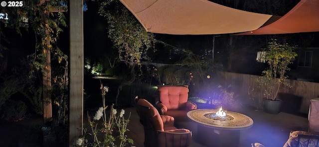 patio at twilight with a fire pit