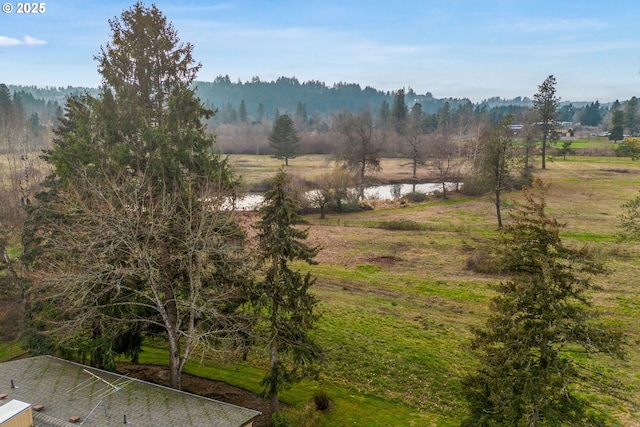 property view of mountains featuring a rural view