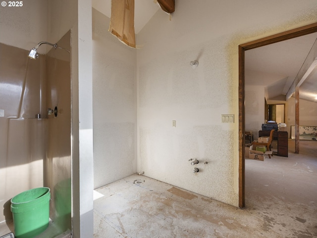 bathroom with concrete flooring