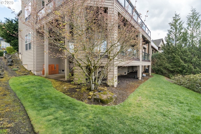 2640 NW Birkendene St, Portland, OR 97229 - view of side of home with a yard