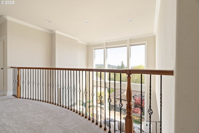 hall featuring recessed lighting, plenty of natural light, and carpet flooring