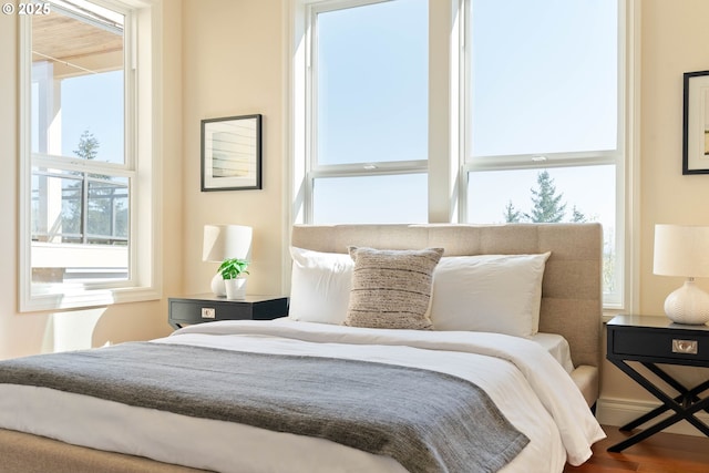bedroom featuring wood finished floors