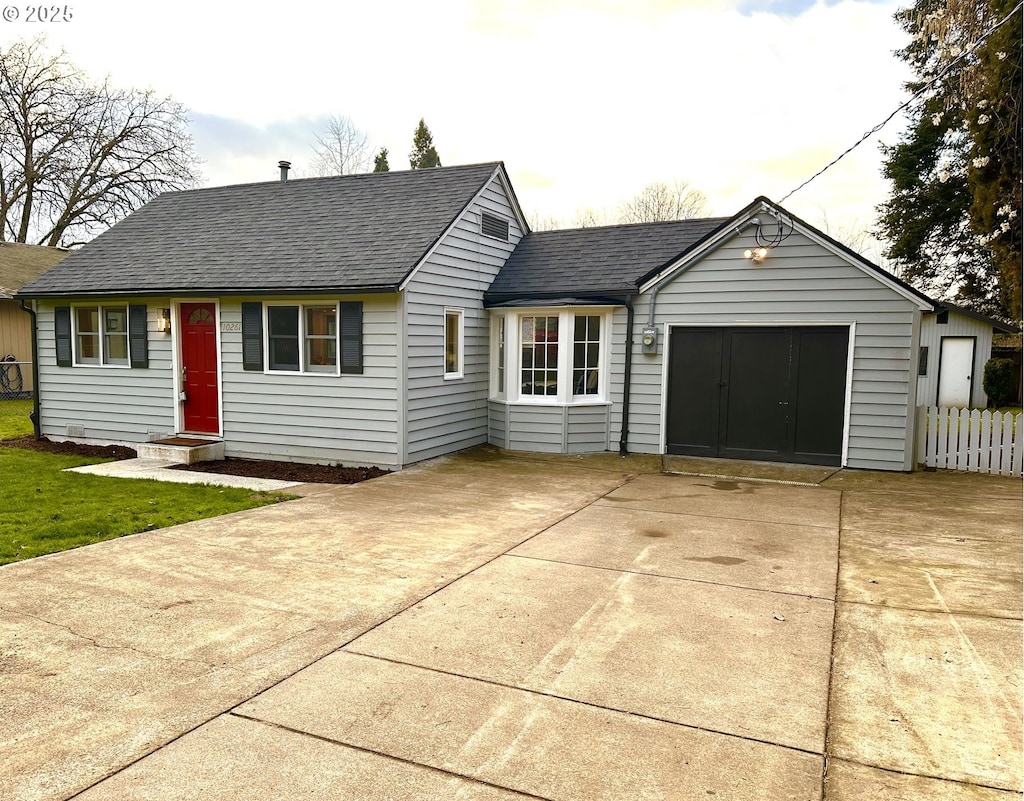 ranch-style house with a garage