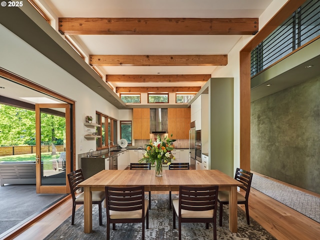 448 NW Skyline Blvd, Portland, OR 97229 - dining space with wood finished floors and beam ceiling