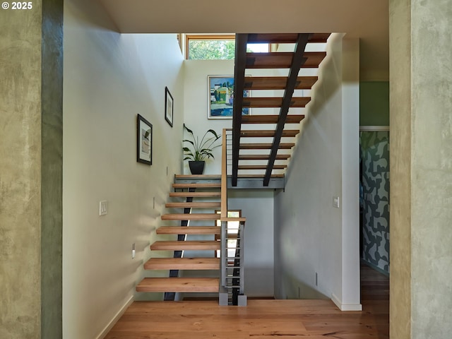 448 NW Skyline Blvd, Portland, OR 97229 - staircase featuring wood finished floors and baseboards